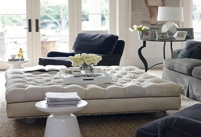 Cream Tufted Ottomans Meet Glass Light
