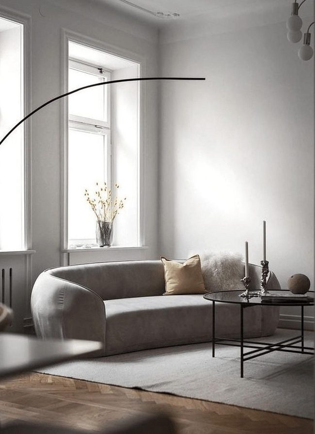 Curved Gray Seating With Natural Warmth
