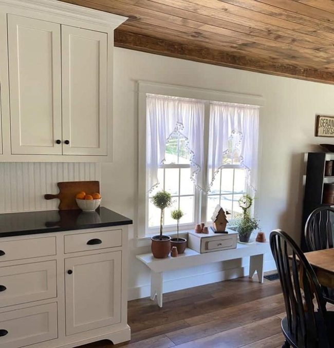 Cream Cabinets Meet Warm Wood Floors