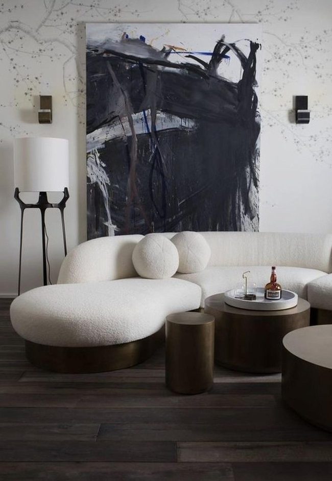 Curved White Sofa Black Accent Art