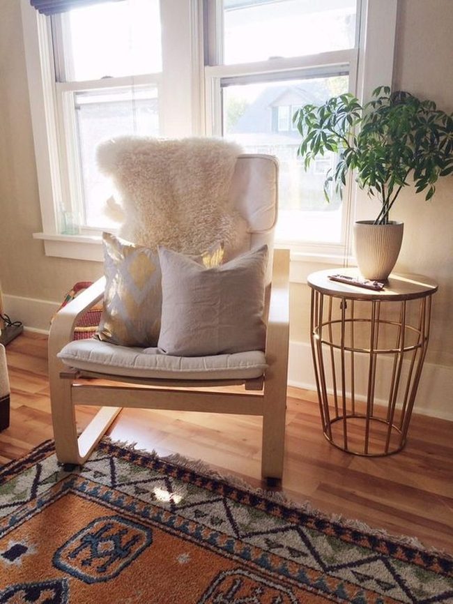 Sunlit Room With White Cushioned Chair