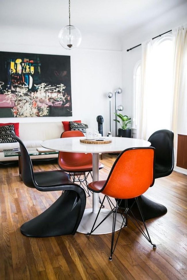 Black Chairs Meet Abstract Wall