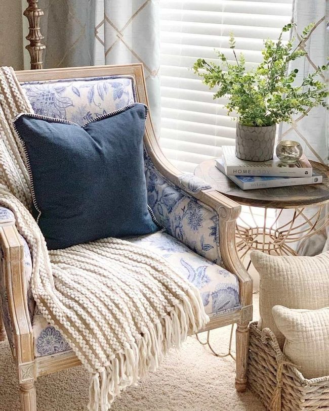 Blue Floral Chair With Stained Wood Table