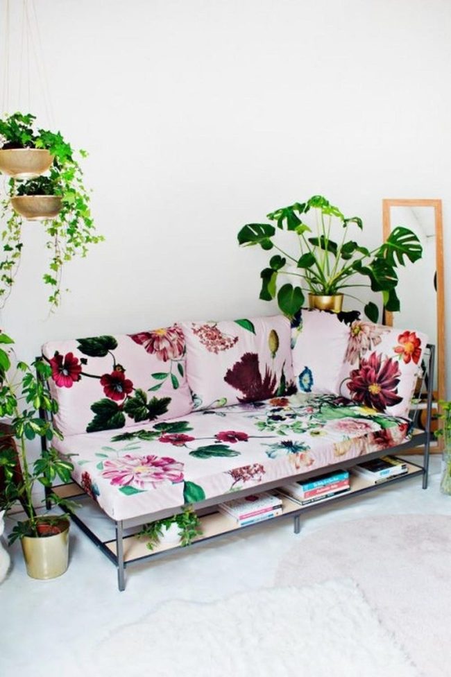 Pink Floral Sofa With Hanging Plants