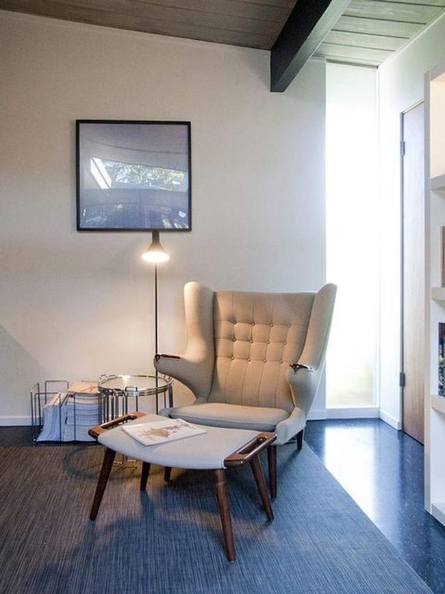 Light Gray Chair And Wooden Legs