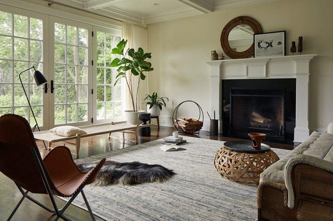 Round Mirrors Behind Framed Artwork