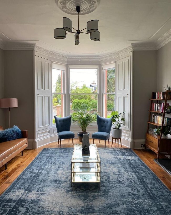 Blue Chairs Gray Walls Natural Light