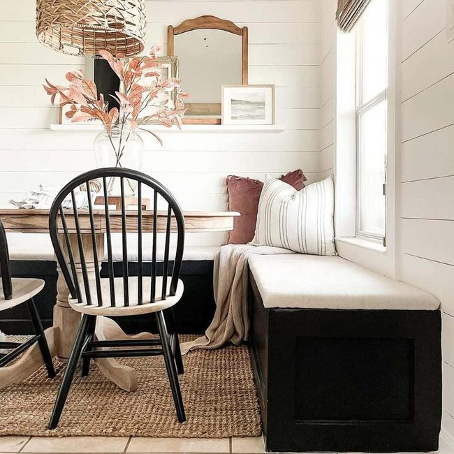 White Cushioned Nook With Shiplap Walls