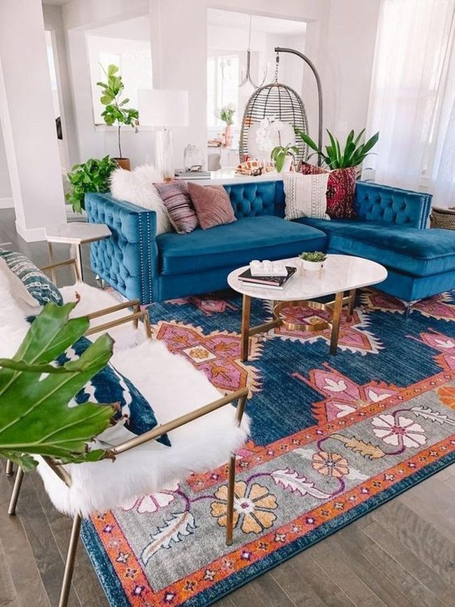 Blue Sectional Meets Warm Patterned Rug