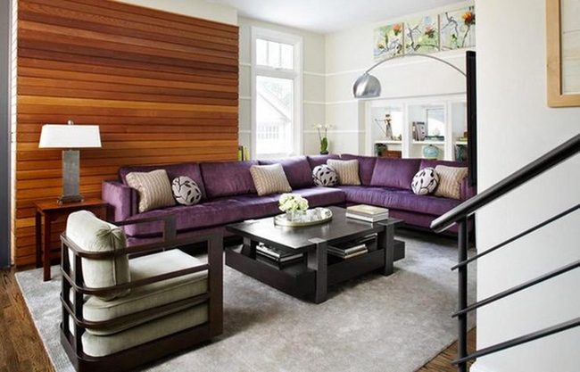 Purple Sectional With Warm Wood Tones