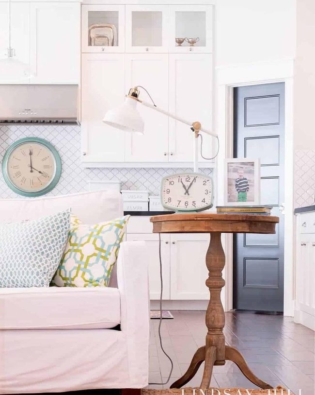 Turquoise Pillows On Retro White Sofa