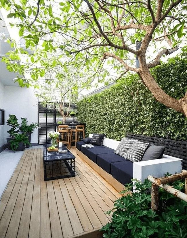 Dark Cushions Against White Furniture