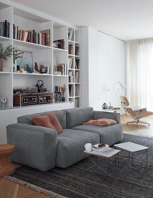 Gray Couch, Bright Windows, Light Wood