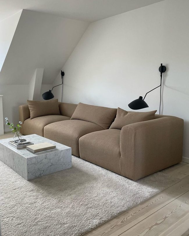 Brown Plush Sofa With Marble Contrast