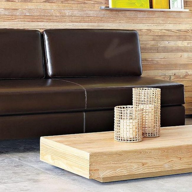 Dark Leather Meets Warm Wood