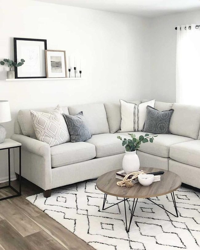 Gray Sectional With Geometric Rug