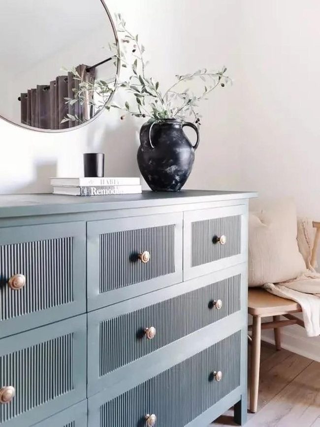 Green Grooved Dresser Minimalist Bedroom