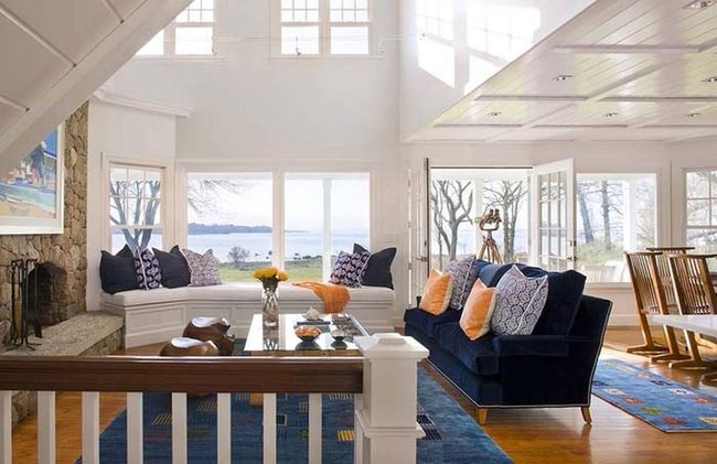 Deep Blue Sofa With Warm Accents