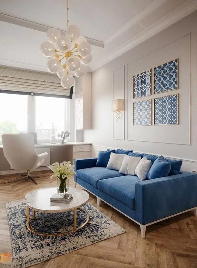 Deep Blue Sofa Meets Herringbone Wood