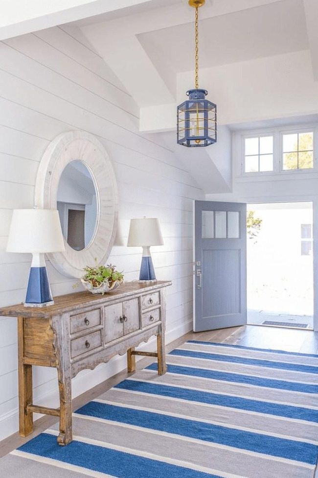 Light Blue Door With Striped Welcome