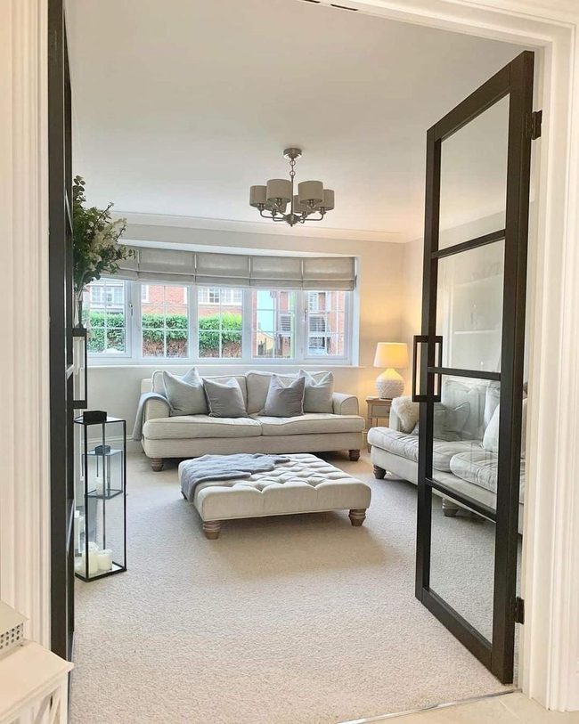 Beige Sofas With Black Lantern Accents