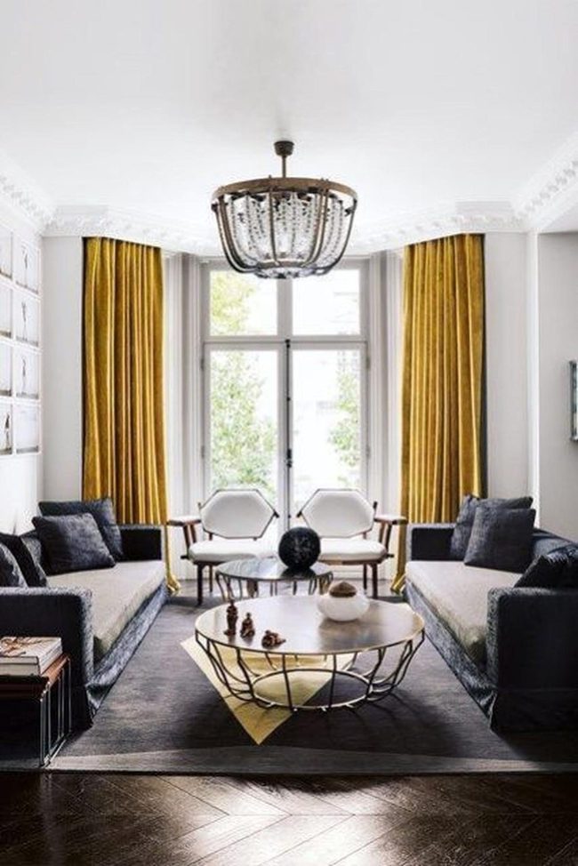 Beaded Metal Chandelier Anchors Gray Seating