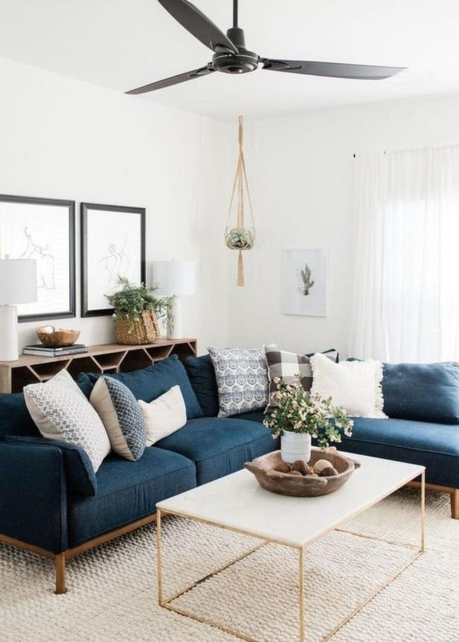 Deep Blue Sofa With Gold Accents