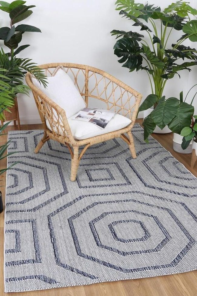 Green Plants And White Wicker Sanctuary
