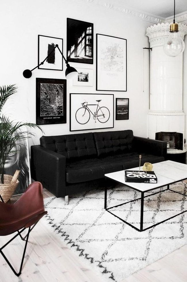 Black Couch Commands Modern Minimalist Space