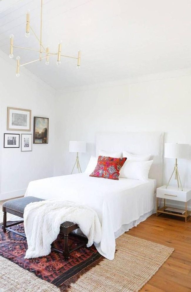 Clean White Bedroom With Layered Warmth