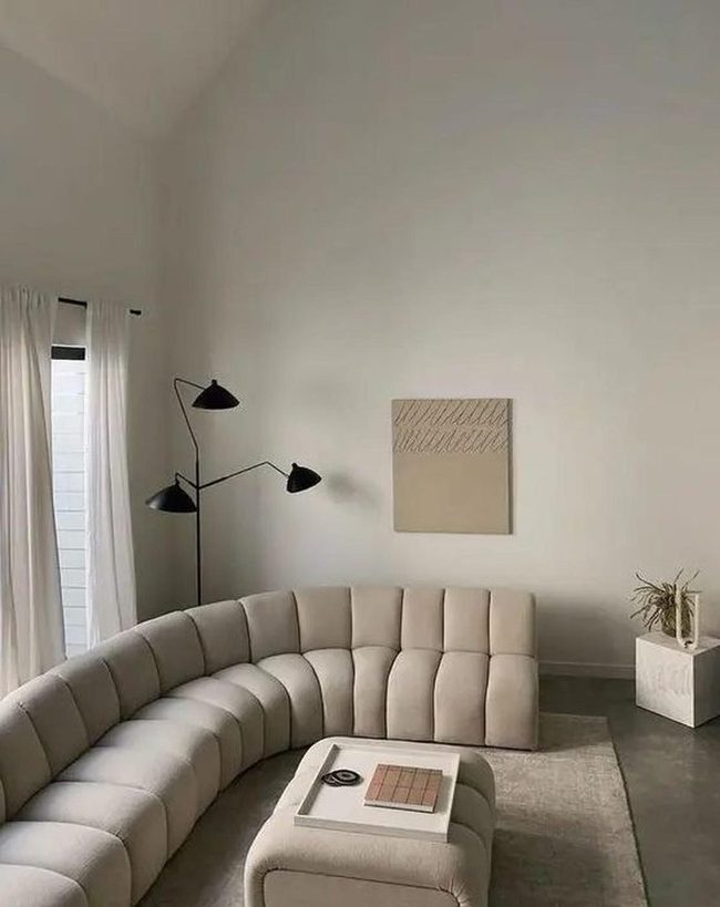 Curved Sofa Meets Neutral Minimalism