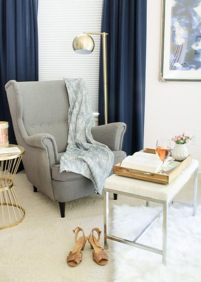 Navy Armchair With Golden Lamp Accents