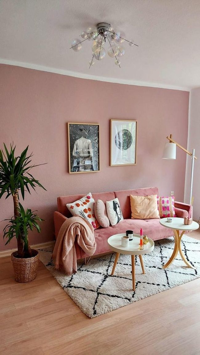 Pink Sofa With Colorful Pillows