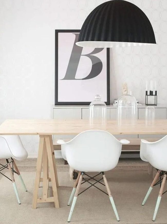 Black Pendant Over Light Wood