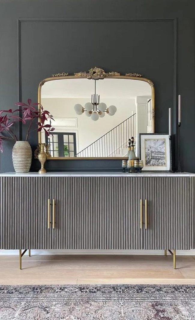Dark Gray Walls With Gold Mirror Accents