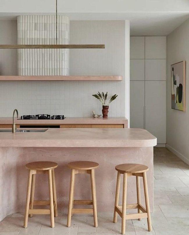 Pink Island Kitchen With White Tiles