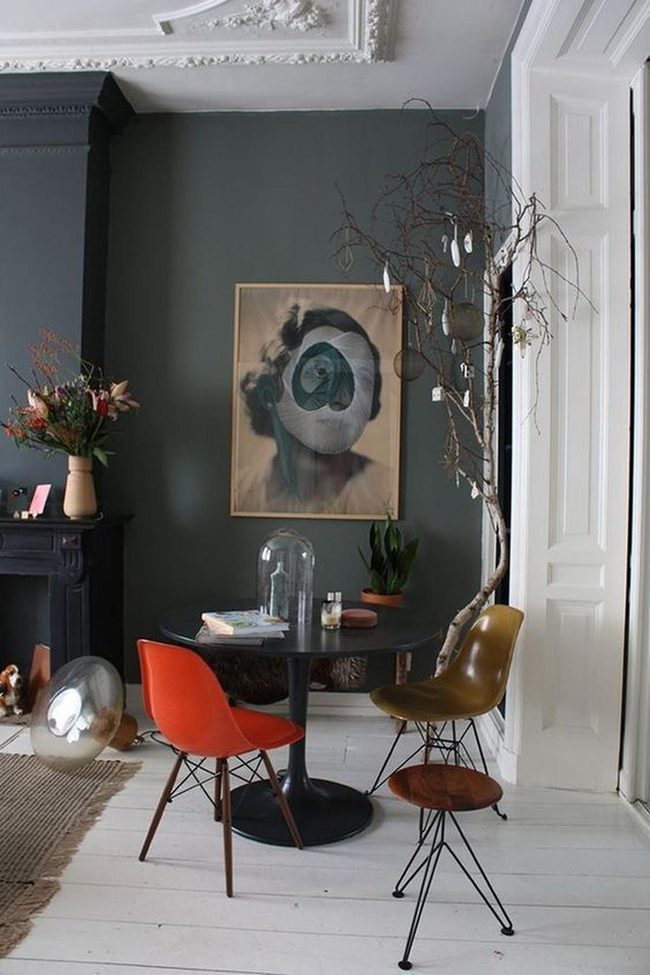Dark Green Walls Orange Chairs Statement