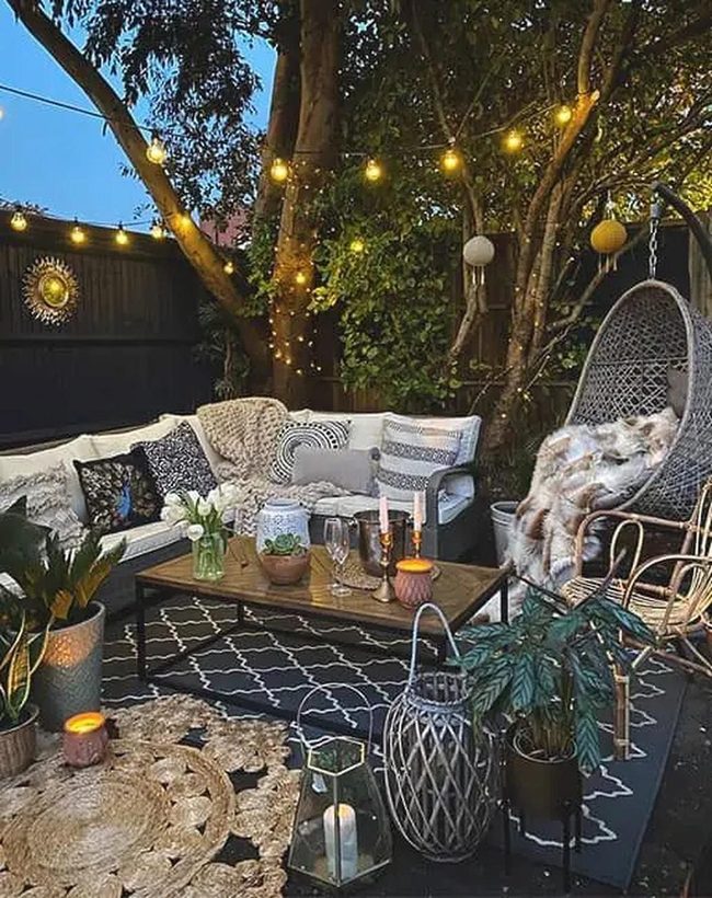 Hanging Chairs Beneath Glowing Lights