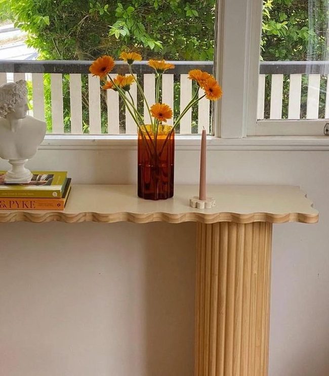 Orange Blooms Frame Sunlit Serenity