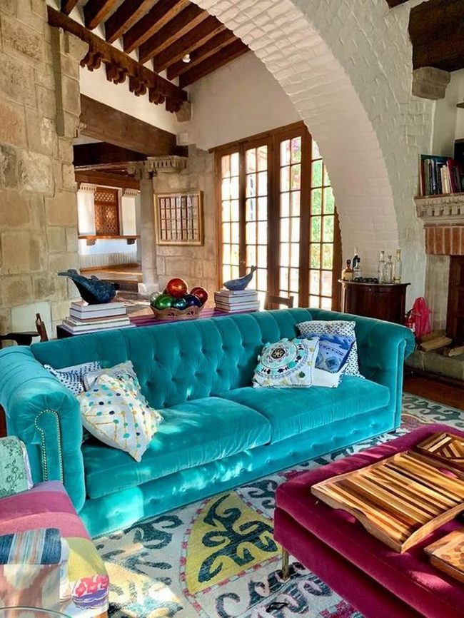 Turquoise Sofa Meets Stone Architecture