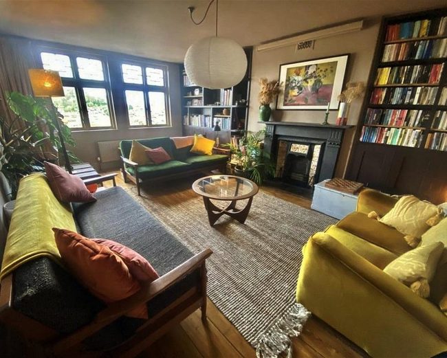 Deep Green Sofas With Warm Earth Tones