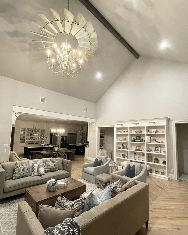 Crystal Chandelier Anchors Gray Living Room