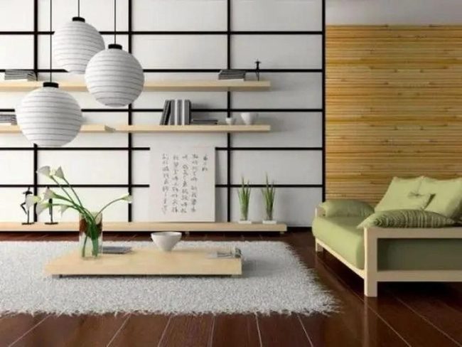 Green Couch Dark Wood Floors