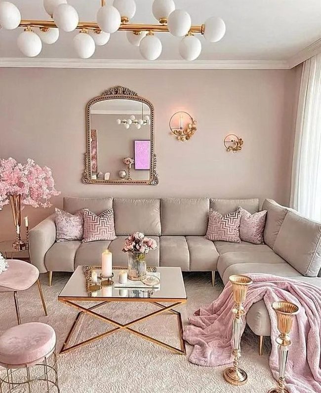 Gold-Framed Mirror Brightens Pink Living Room