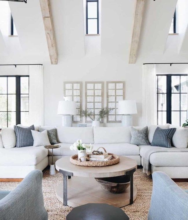 Light Wood Table, White Sectional, Black Frames
