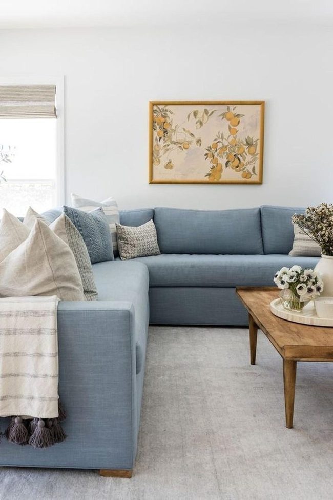 Orange Wall Art Meets Sky Blue Comfort
