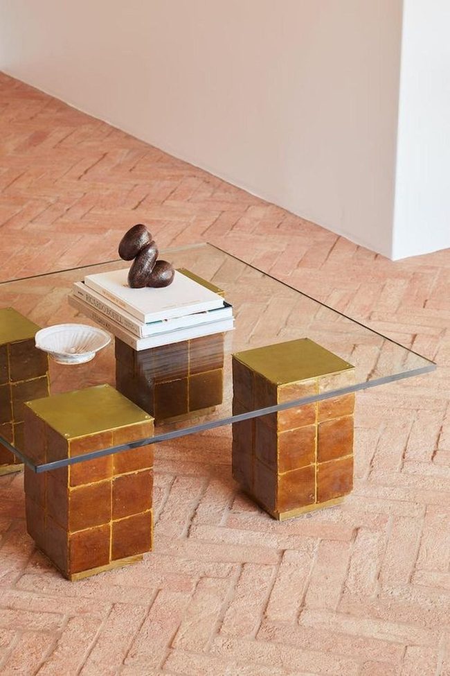 Herringbone Floors With Brass Statement Table