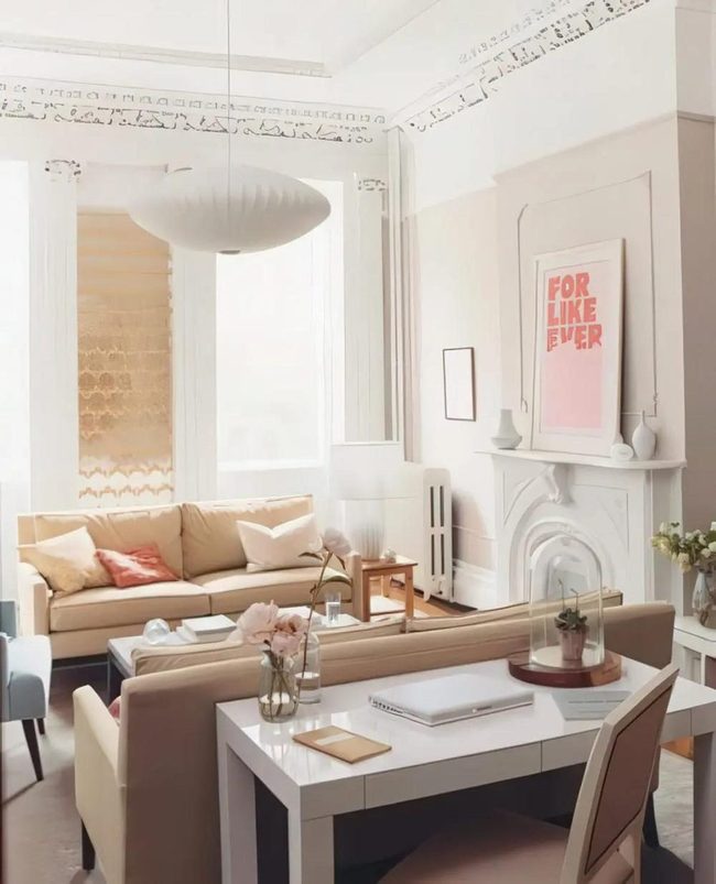 Soft Pink Art Above Cream Sofas