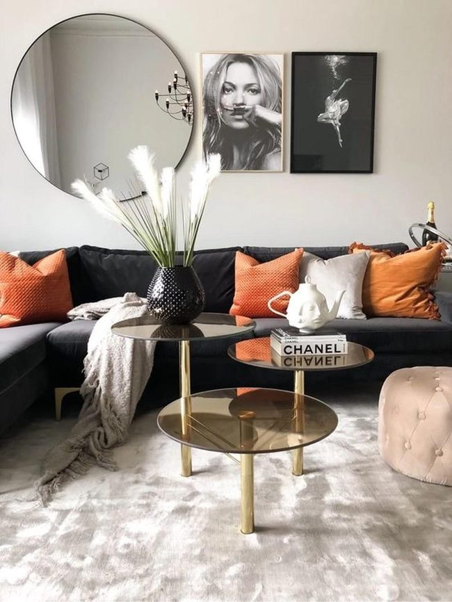 Orange Pillows, Black Art, Gold Accents
