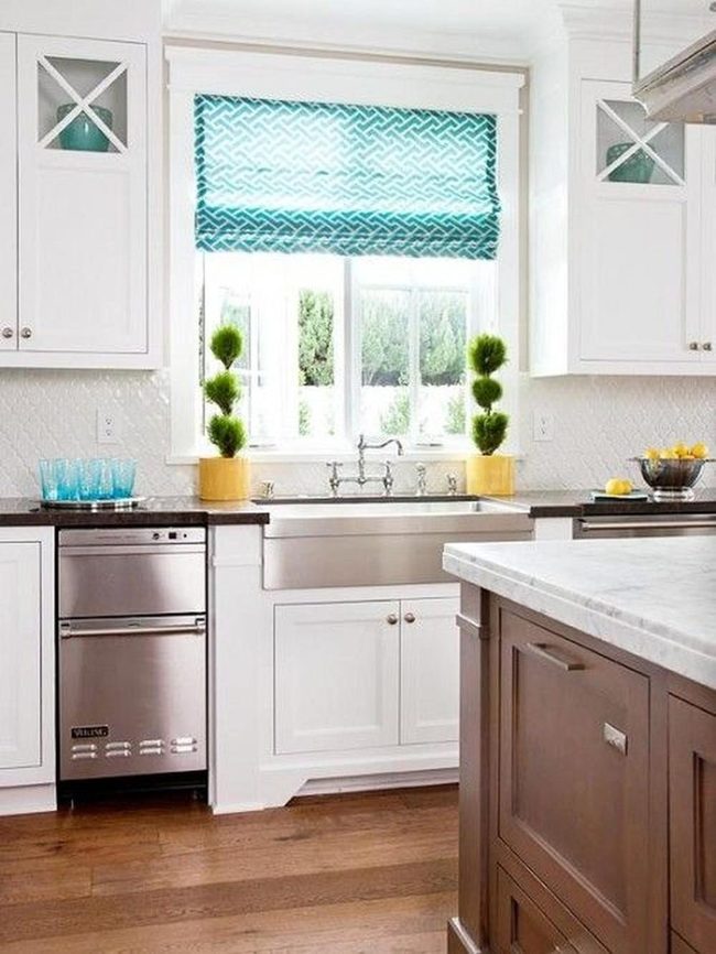 White Kitchen With Yellow Pots And Lemons